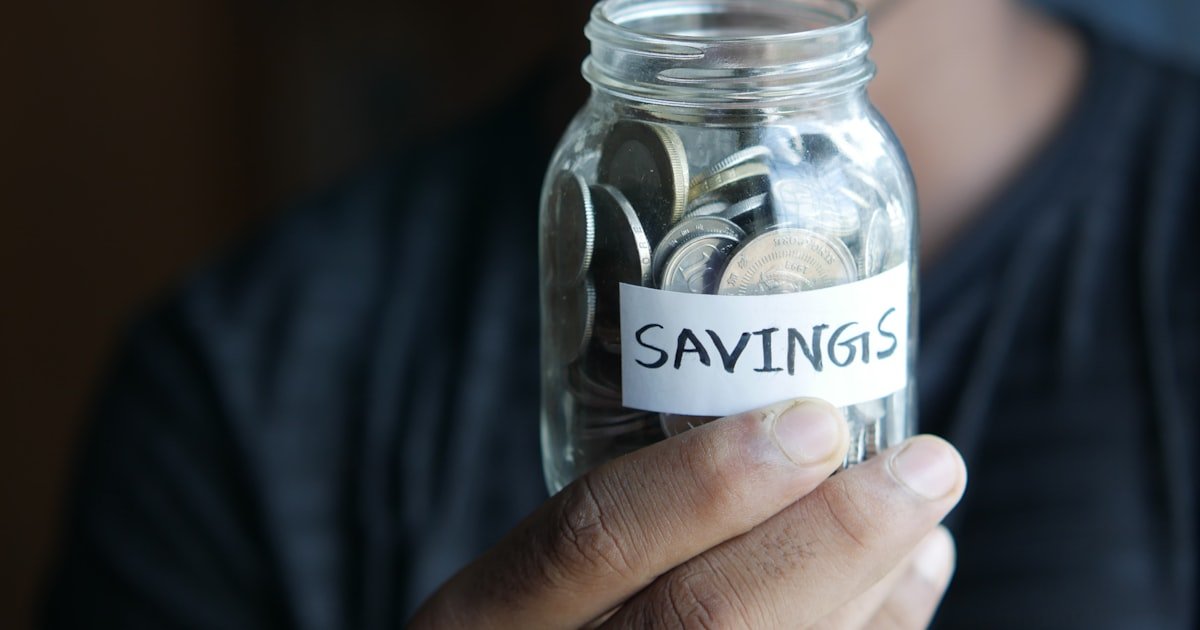 Person checking a savings app on their phone